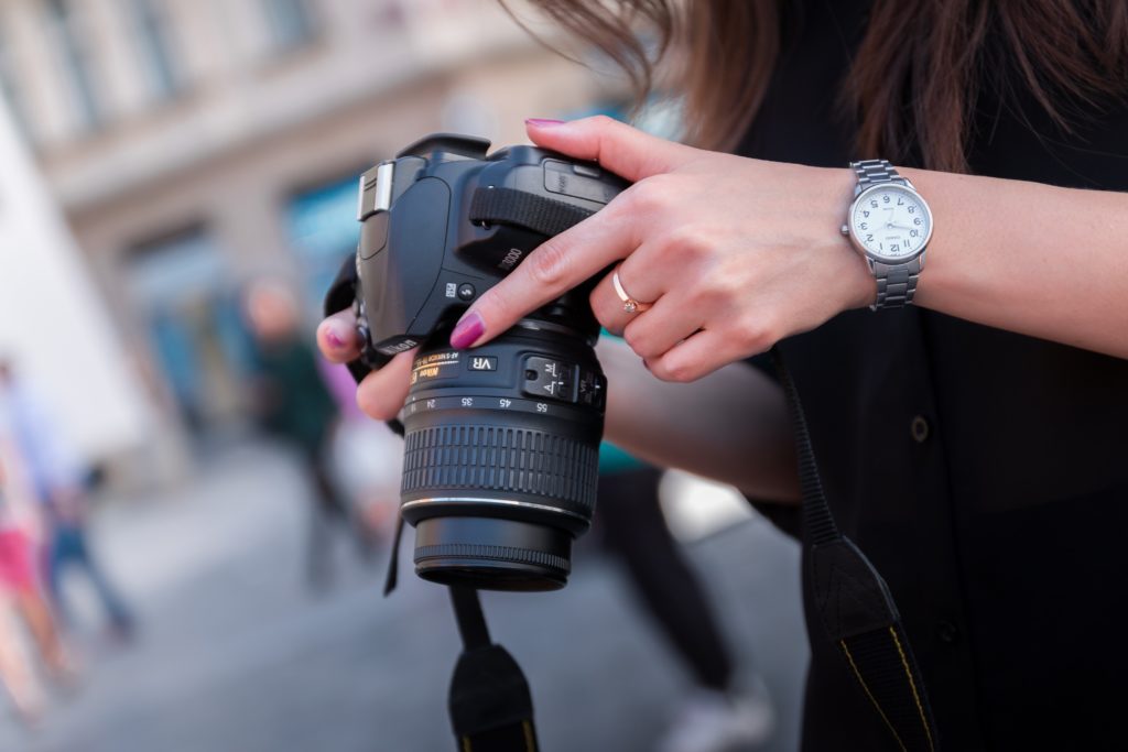 woman holding camera
